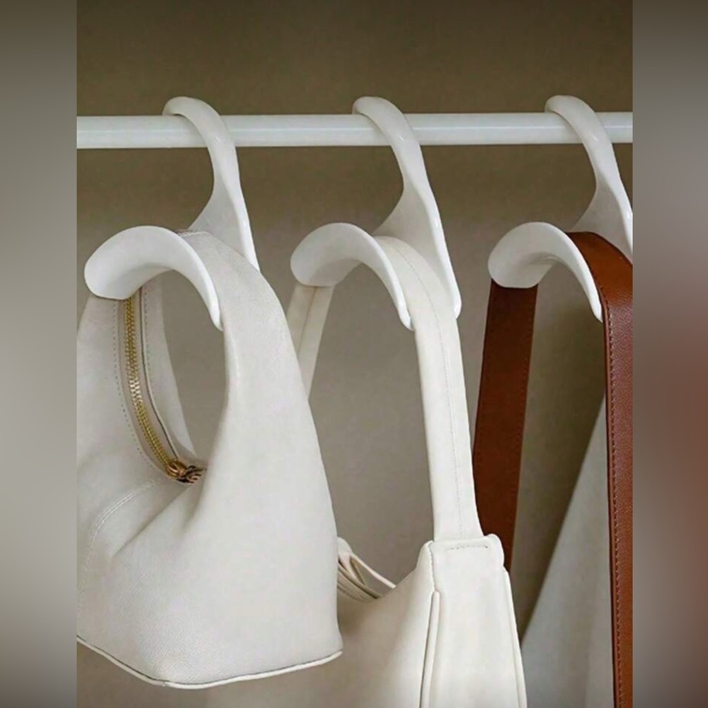 Pack of 4 bag hangers!!! Get as many orders as you need now! They will not last!